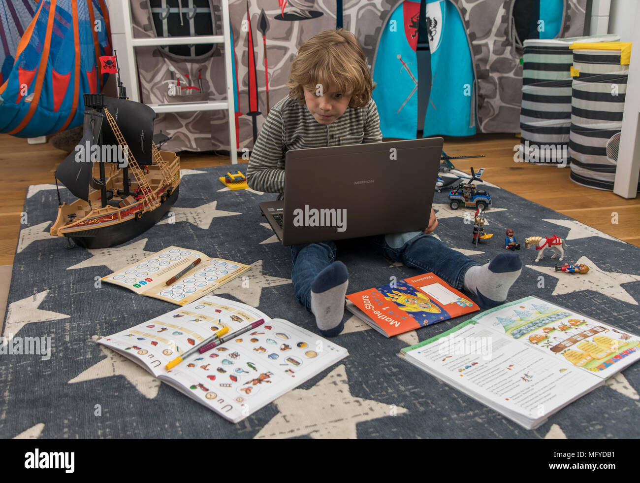 Boy Elementary School Student 8 Years Old Learns For School At