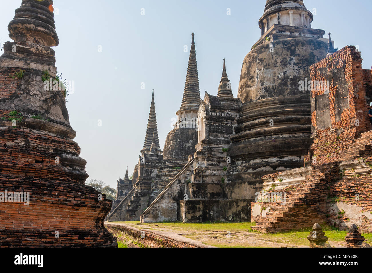 Causeway with row towers in the city of Ayutthaya, which was the relic and financial center of the extinct Kingdom of Siam Thailand Stock Photo