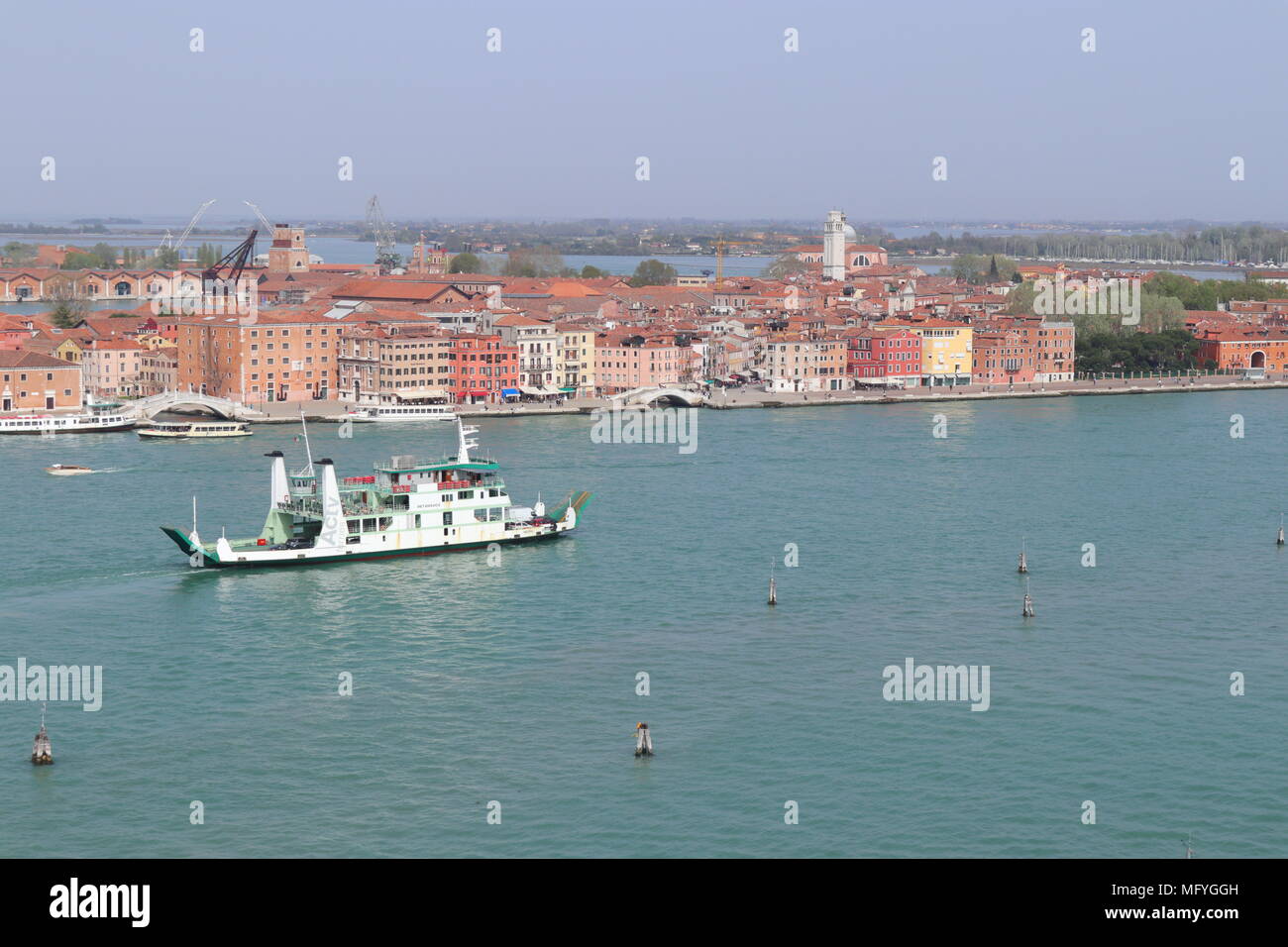 City skyline of Castello, panoramic view from the bell tower of Chiesa di San Giorgio Maggiore, sunny day, large car ferry, Venice, Italy, Europe Stock Photo