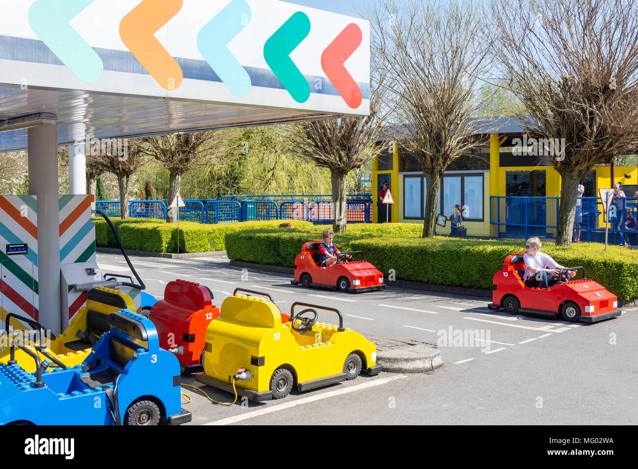 Young boys driving car at Lego City Driving School, Legoland Windsor Resort, Windsor, Berkshire, England, United Kingdom Stock Photo