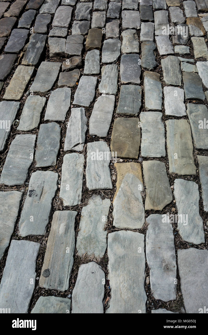 A closeup of a cobblestone road Stock Photo