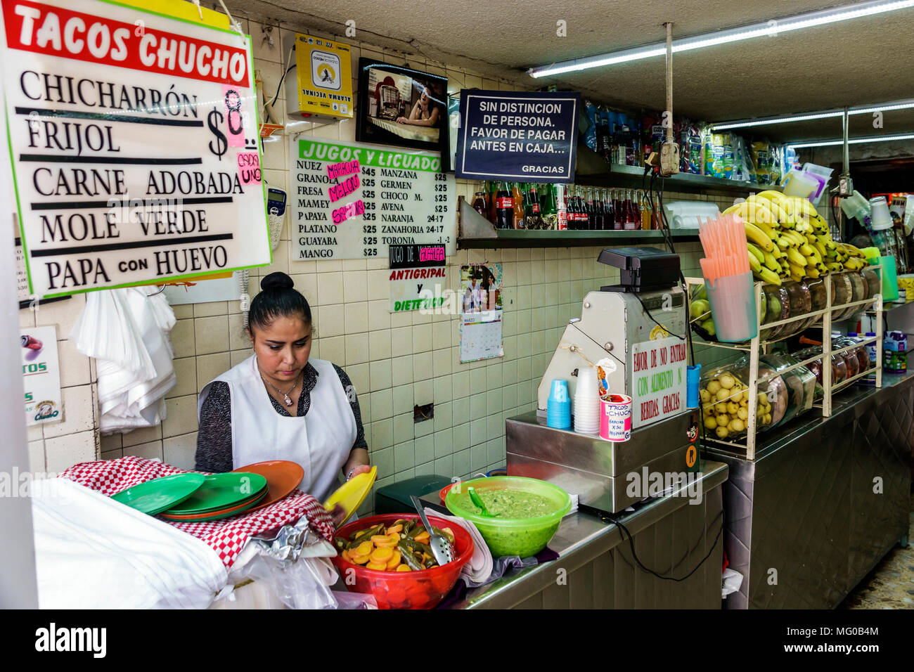 Mexico City,Hispanic,historic Center Centre,Avenida Cinco de Mayo,Tacos Chuco,juice food kiosk,restaurant restaurants food dining cafe cafes,woman fem Stock Photo