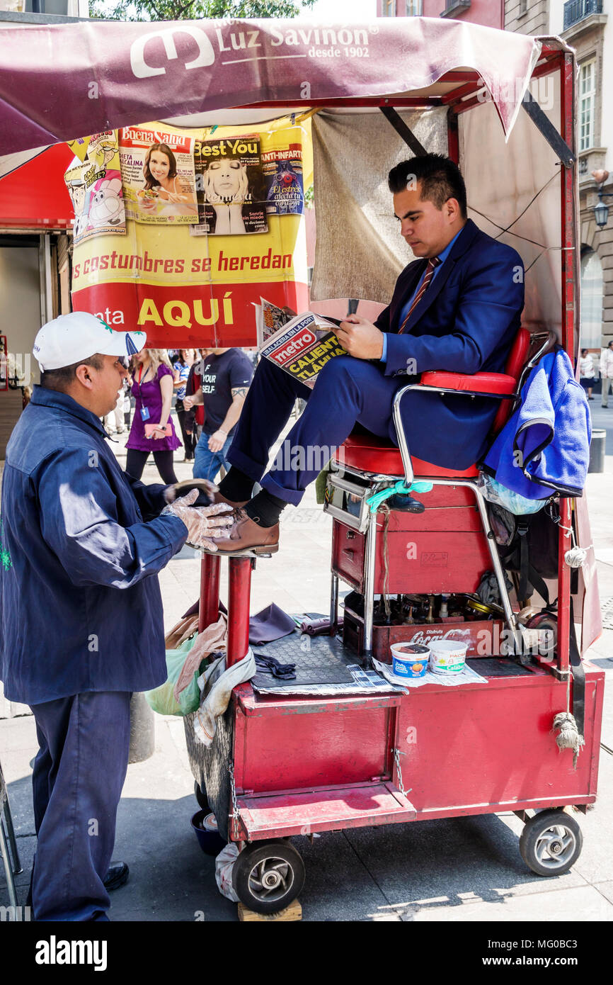 Mexico City,Mexican,Hispanic,historic Center Centre,Calle Gante,pedestrian street,shoe shine stand,shoeshiner,boot polisher,man men male MX180305130 Stock Photo