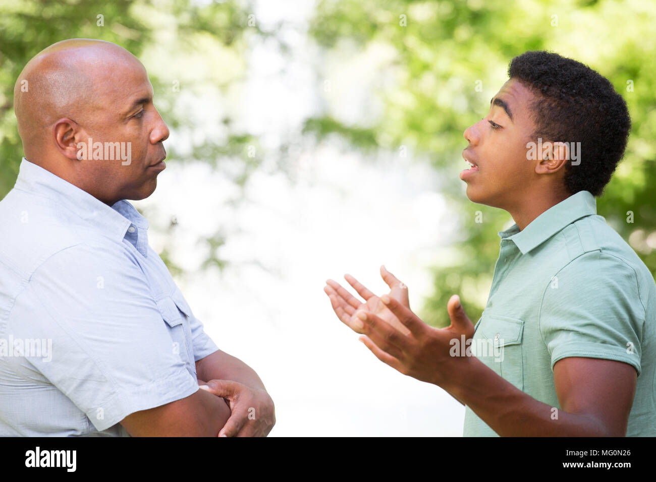 Father and son having a serious conversation Stock Photo - Alamy