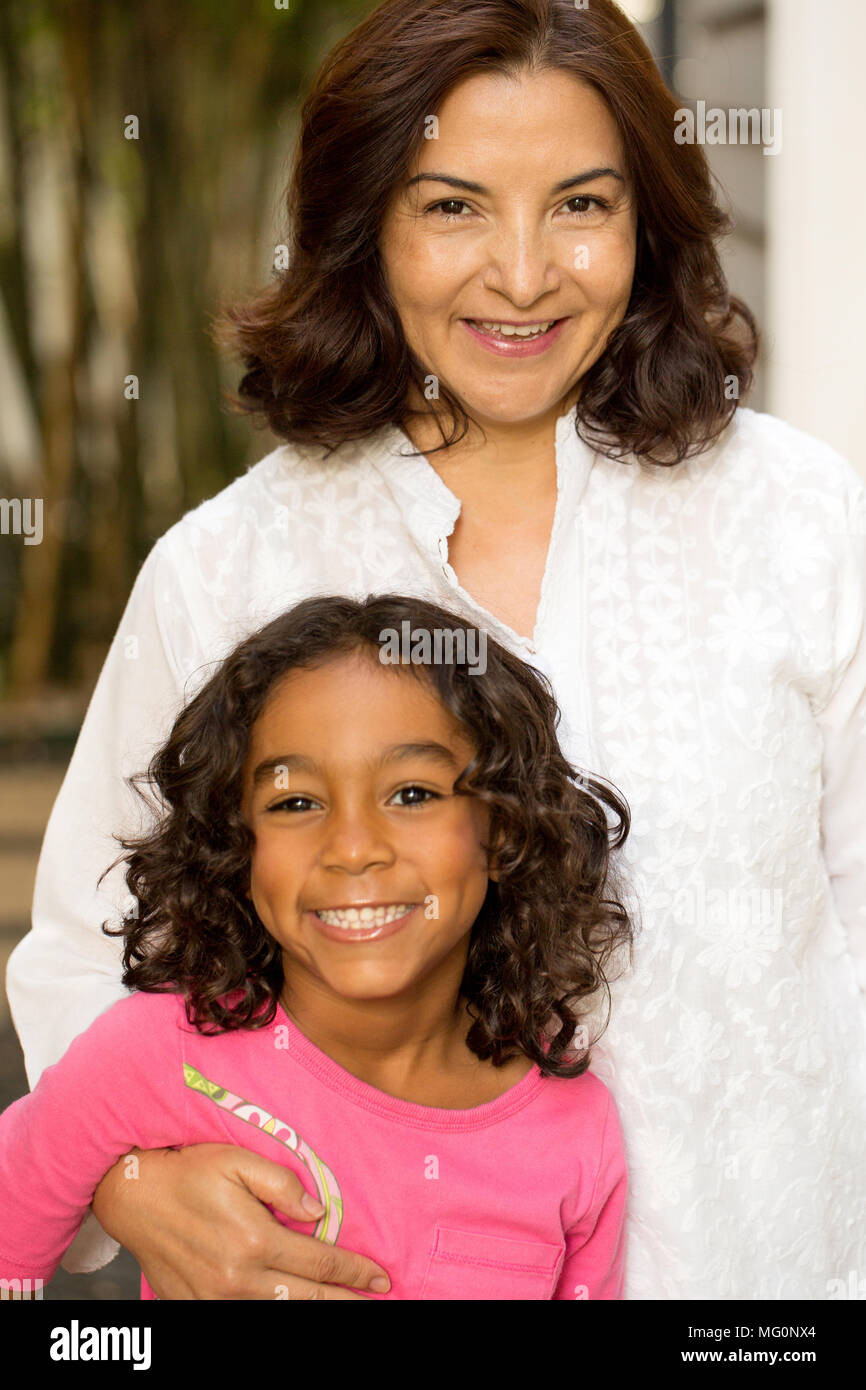 Hispanic mother and her daughter. Stock Photo