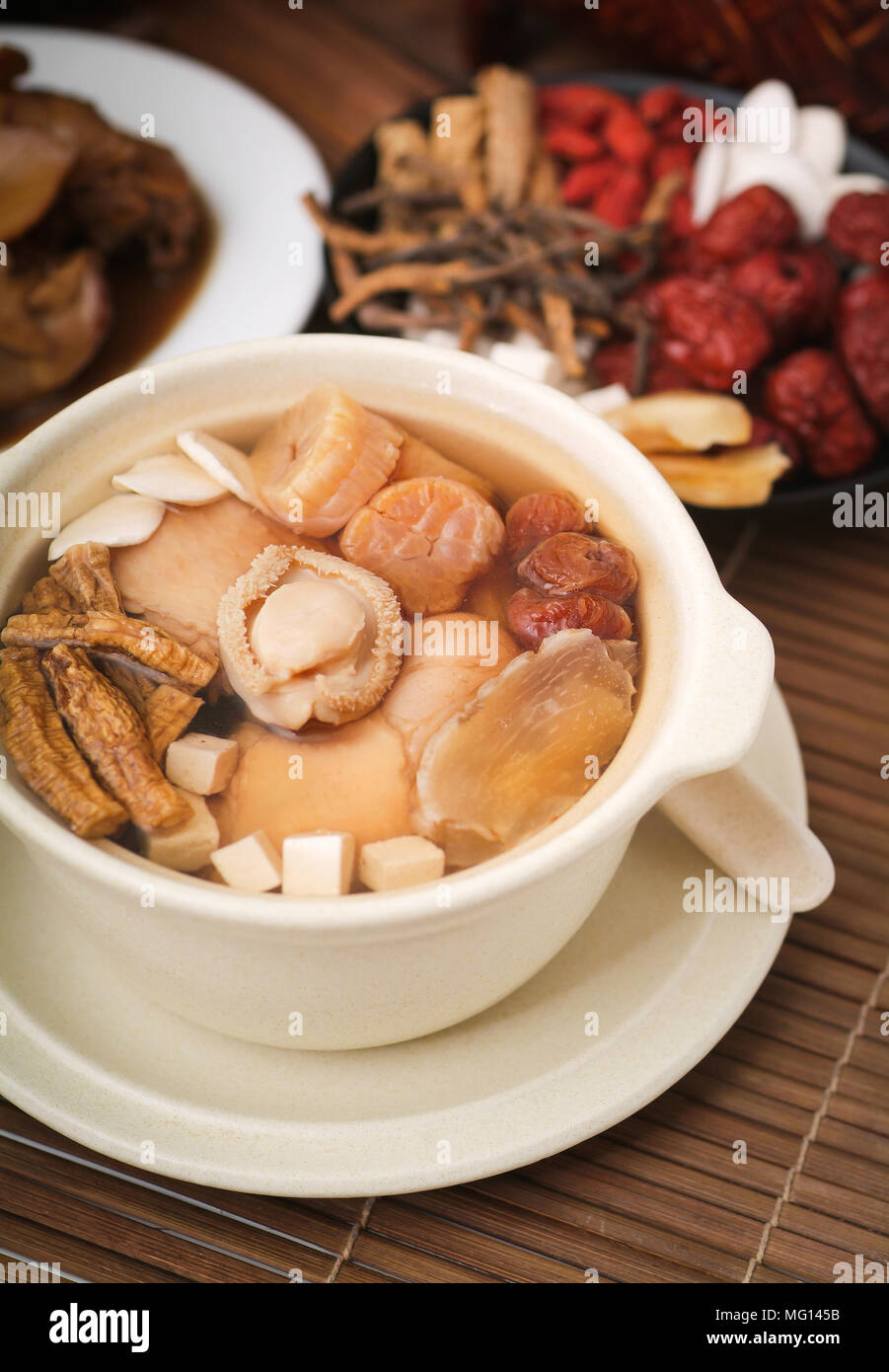 abalone and herb soup in pot, Chinese food style Stock Photo Alamy