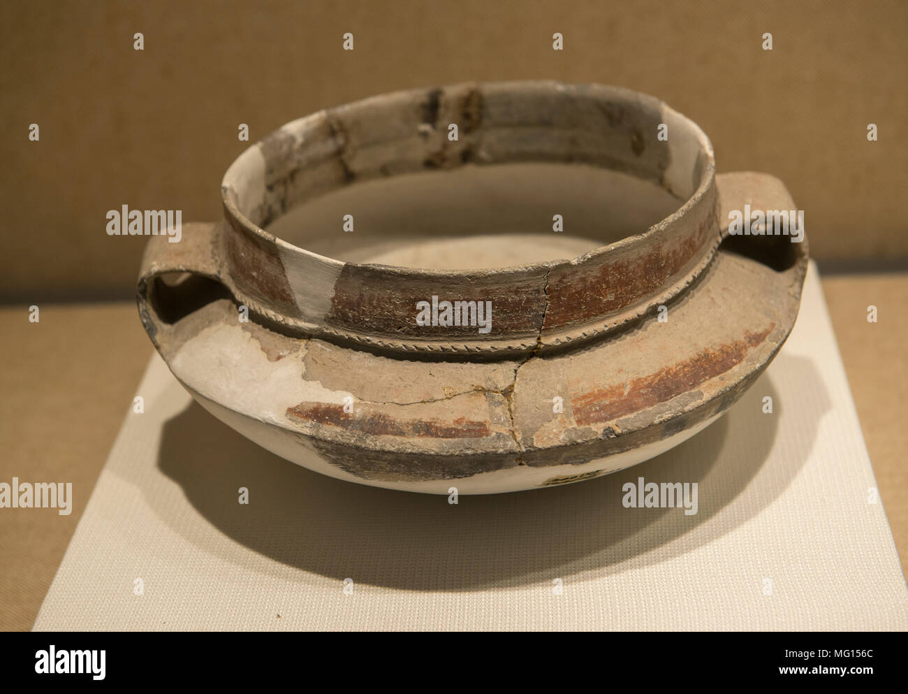 A pottery jar of The Kuahuqiao Culture in Zhejiang Museum in Hangzhou, China. Stock Photo