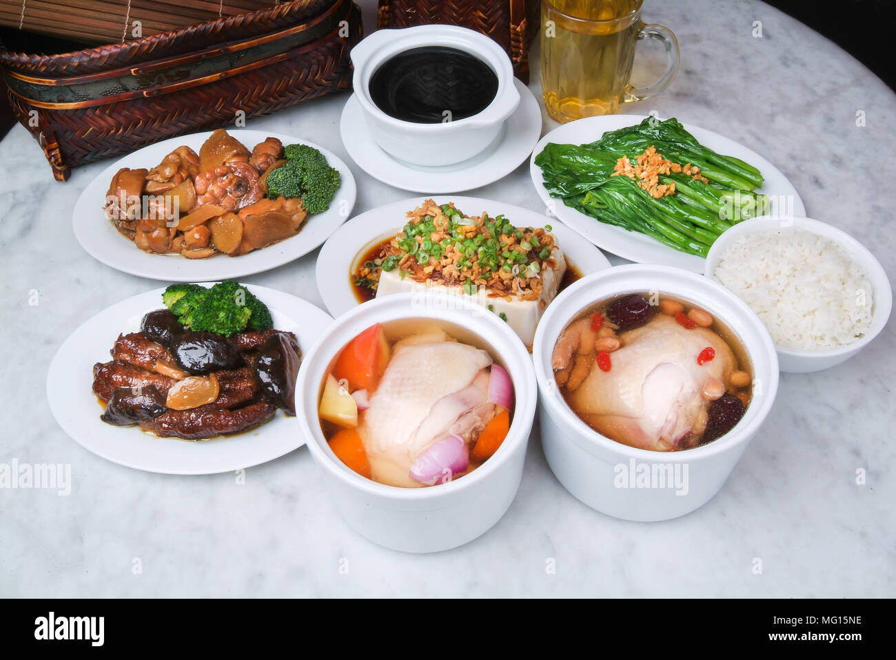 Chinese Dinner set. chicken, vegetable, soup and rice on background ...