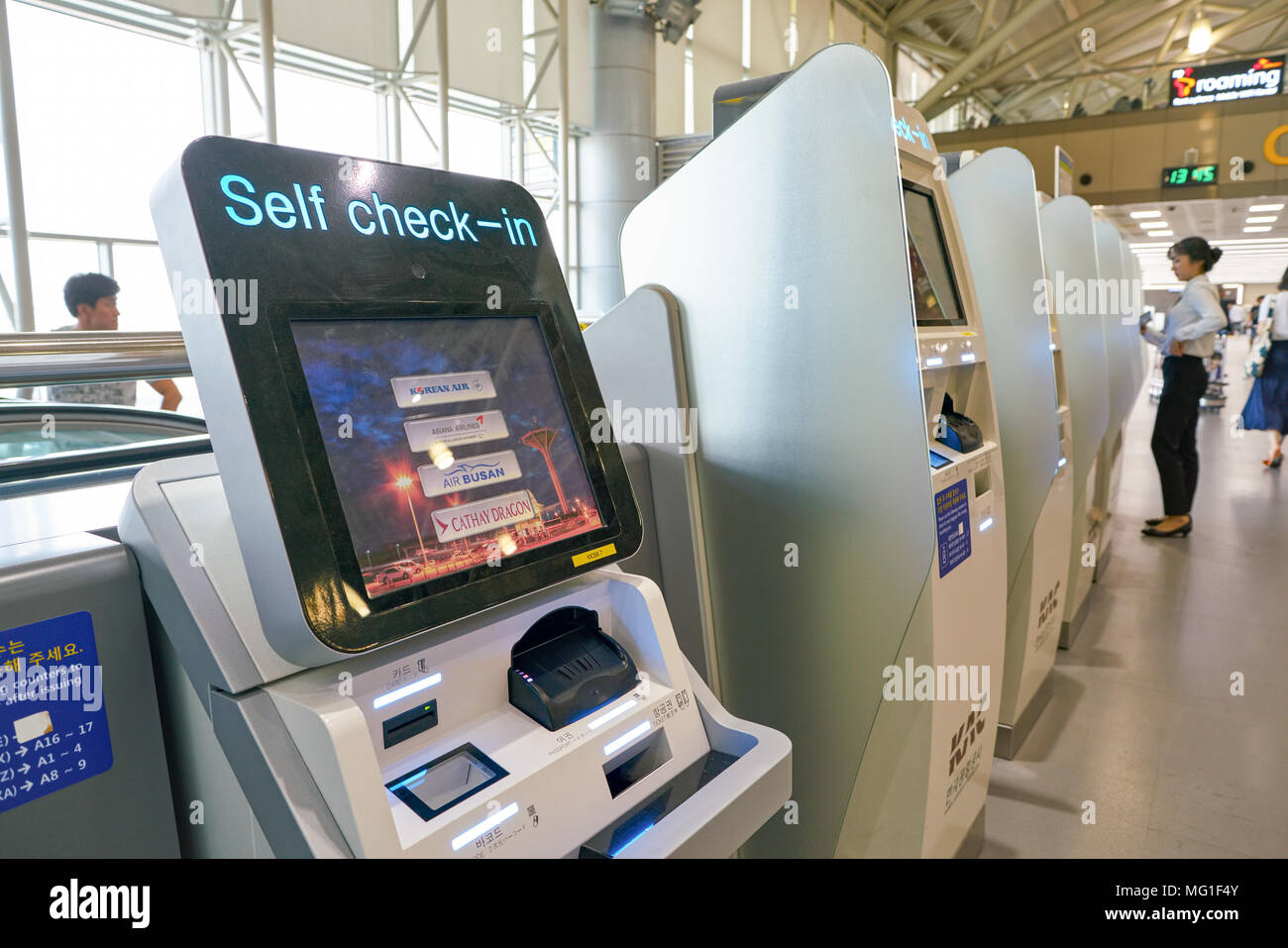 BUSAN, SOUTH KOREA - CIRCA MAY, 2017: self check-in kiosks at Gimhae ...