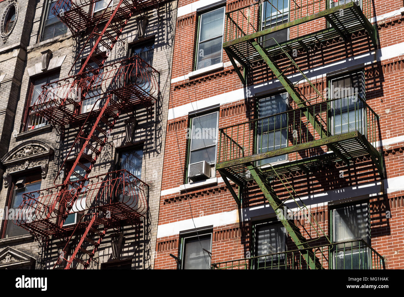Red and Green Fire Escapes, Little Italy New York Stock Photo