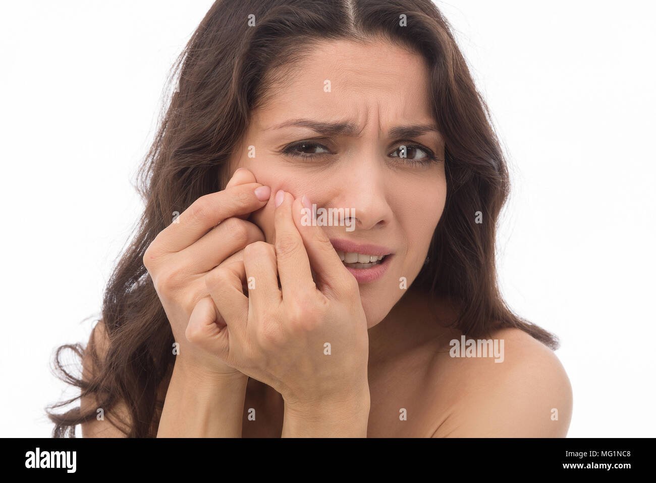 Portrait of an angry brunette woman Stock Photo
