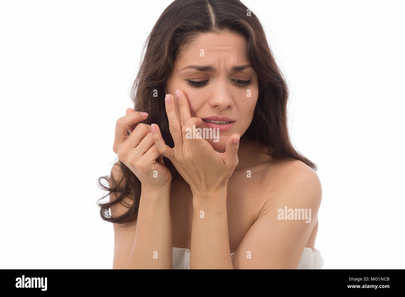 Portrait of an angry brunette woman Stock Photo