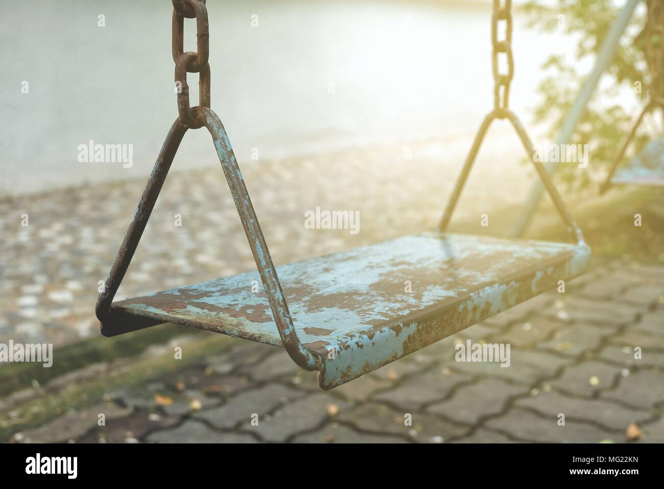 Old metal swing set hires stock photography and images Alamy