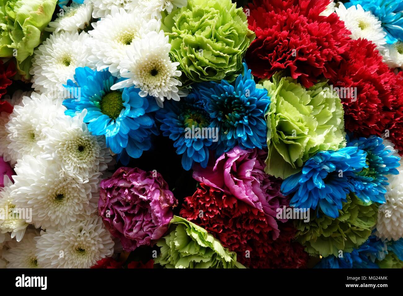 Vibrant arrangement of various colorful flowers hi-res stock ...