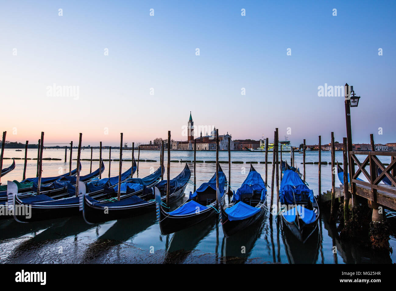 Gondolas in Venice, Italy at sunrise Stock Photo - Alamy