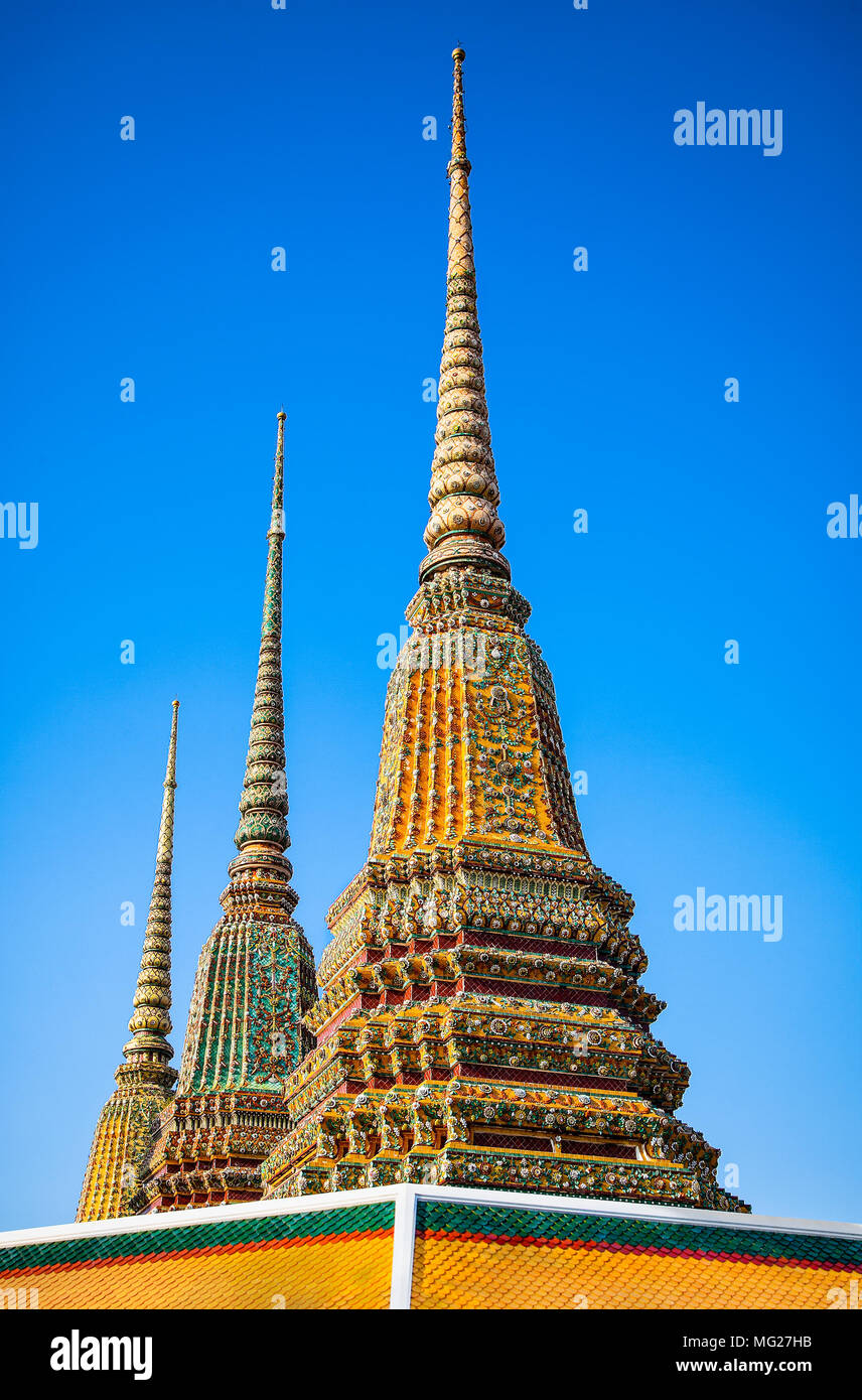 Wat Pho known also as the Temple of the Reclining Buddha is a royal temple of the first grade, one of ten such temples in Bangkok and 23 in Thailand. Stock Photo