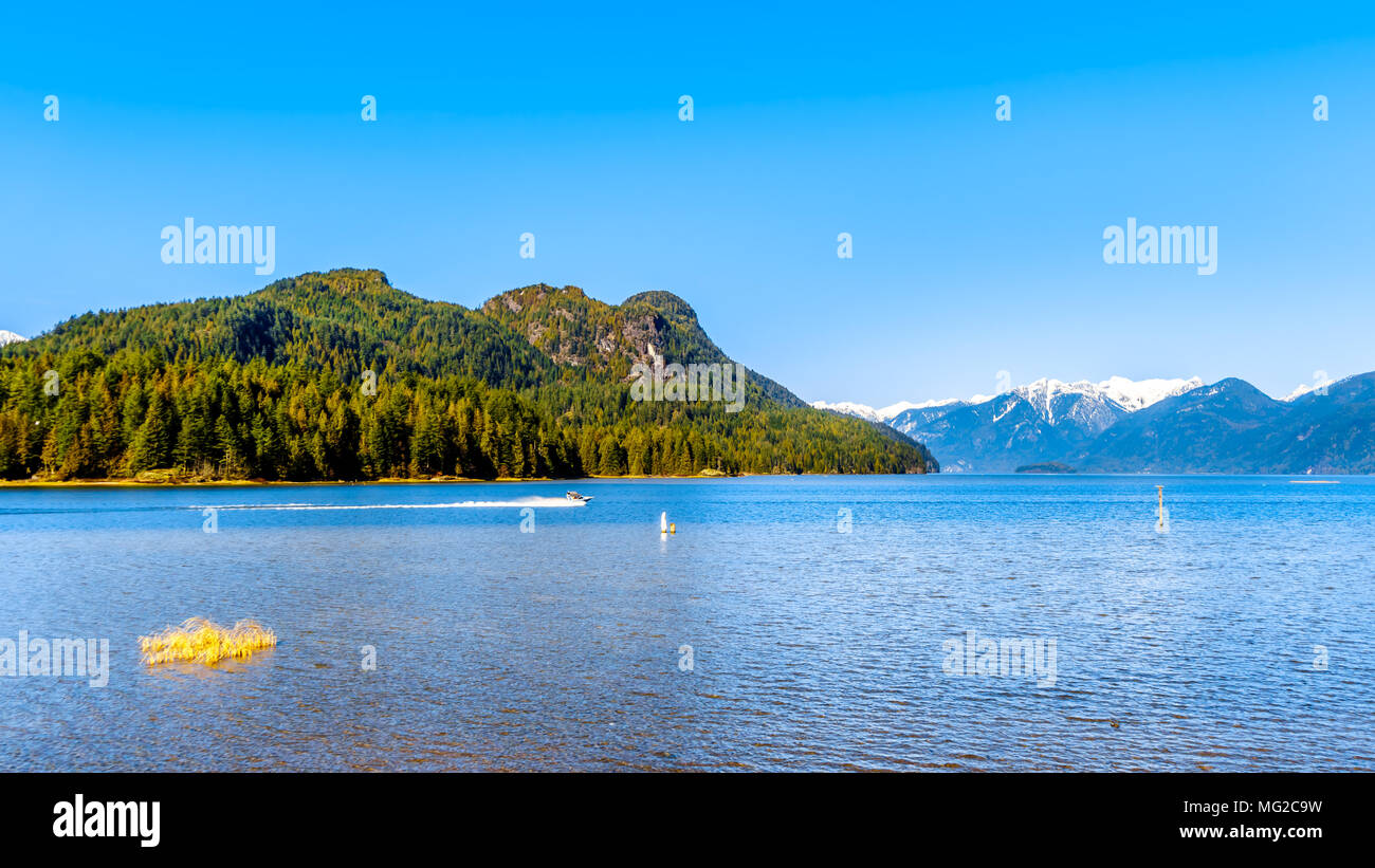 Fishing Boat on Pitt Lake with the Snow Capped Peaks of the Golden Ears ...