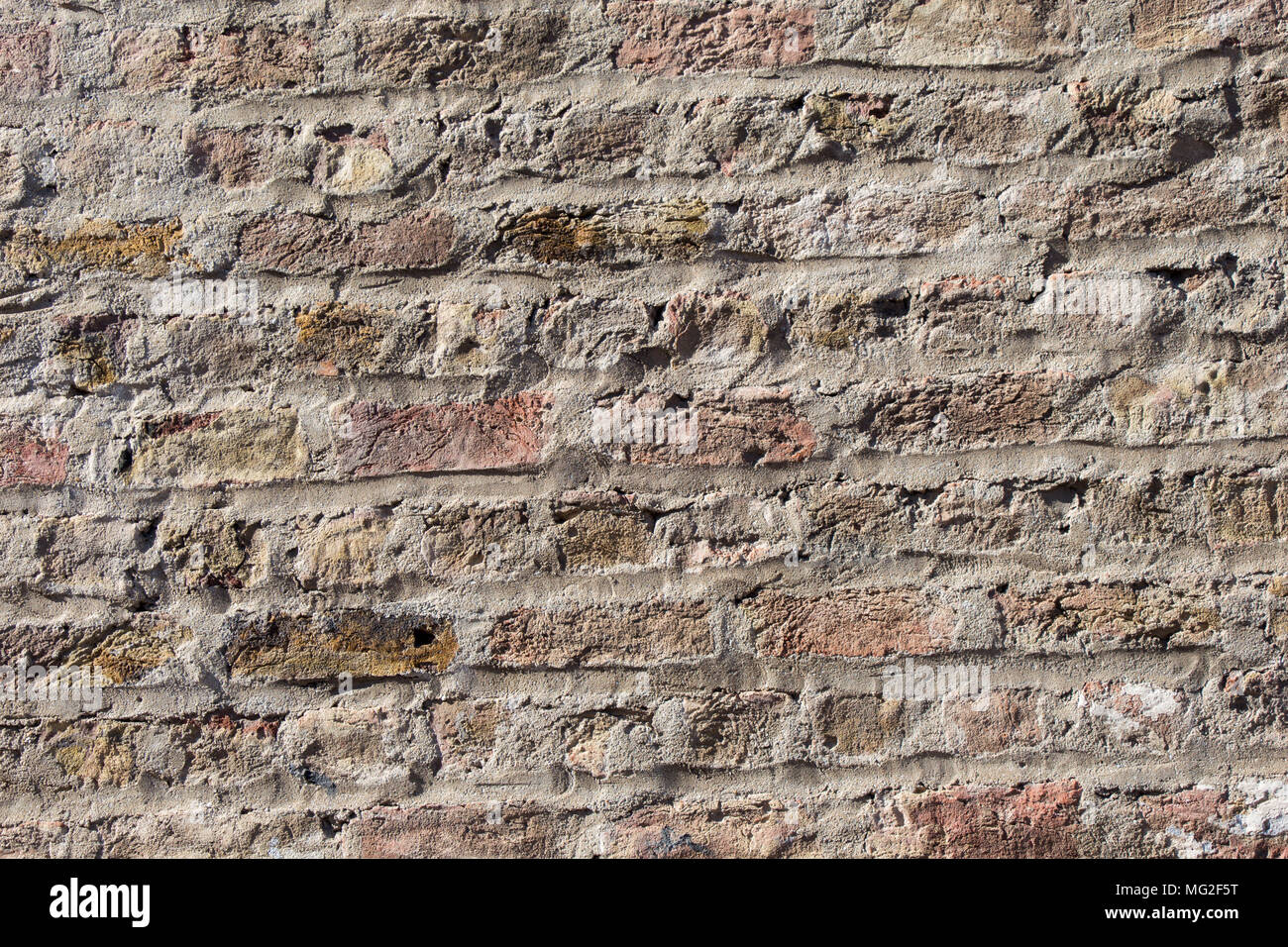 Old grunge brick wall as a background Stock Photo - Alamy