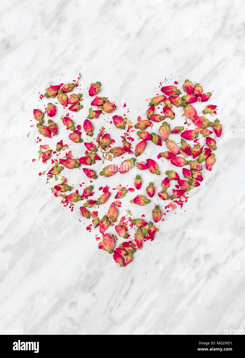 Heart made rose petals hi-res stock photography and images - Alamy