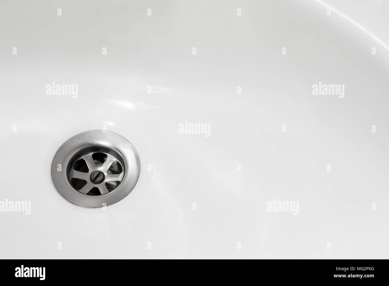 black tool sink plunger in bathroom sink Stock Photo - Alamy