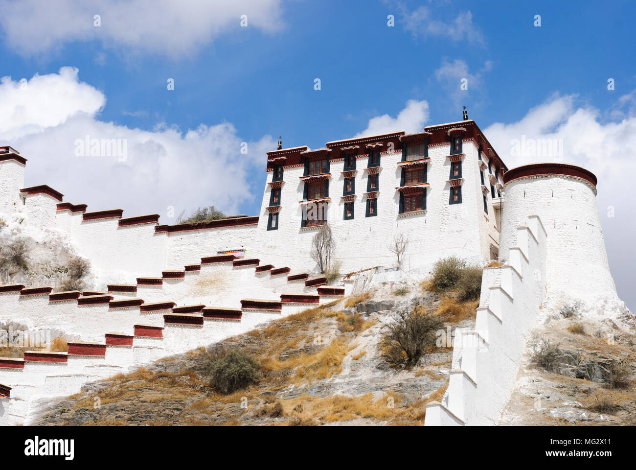 The Potala palace wall in Lhasa, Tibet and the blue sky Stock Photo - Alamy