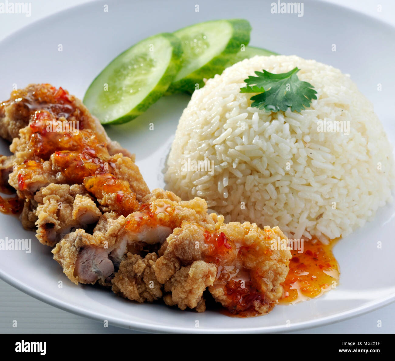 chicken rice. Asian style hainan chicken rice closeup Stock Photo - Alamy