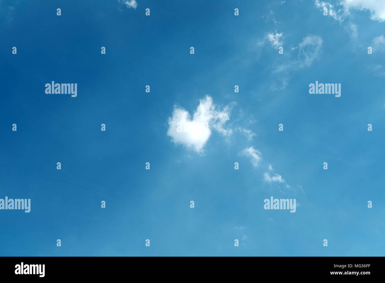 Blue Sky with Cloud in Little Heart Shape Background Stock Photo - Alamy