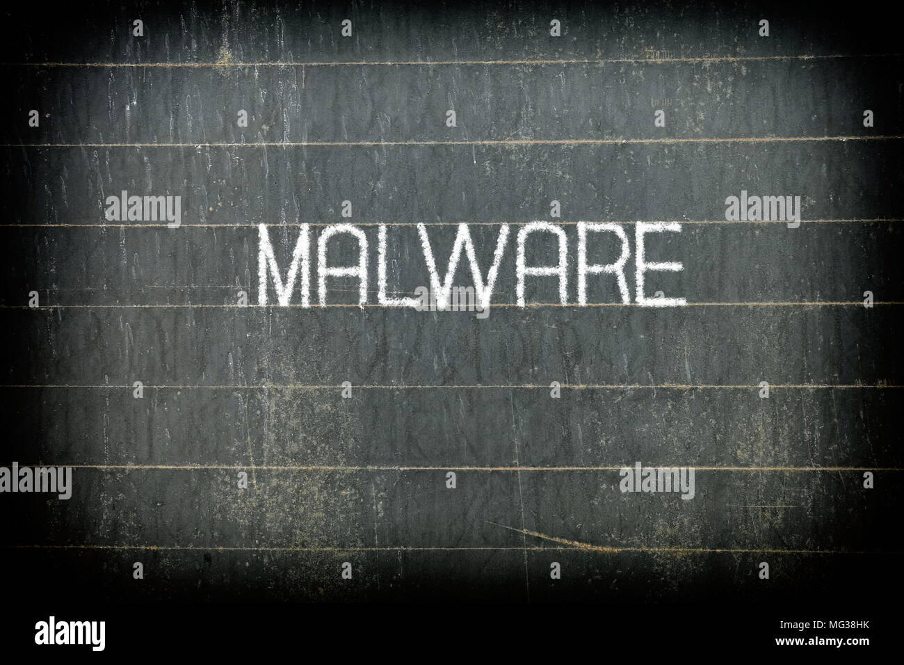 "MALWARE" Chalk Writing on Old Chalkboard Background. Stock Photo