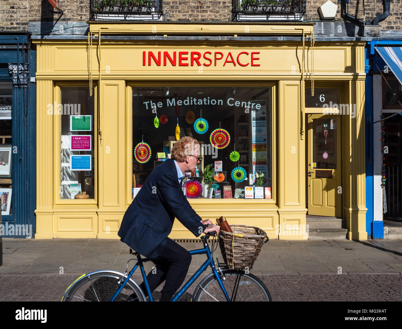 Meditation Centre - a commuter cycles past the Innerspace Meditation Centre in Cambridge UK. Innerspace is an initiative of the Brahma Kumaris. Stock Photo