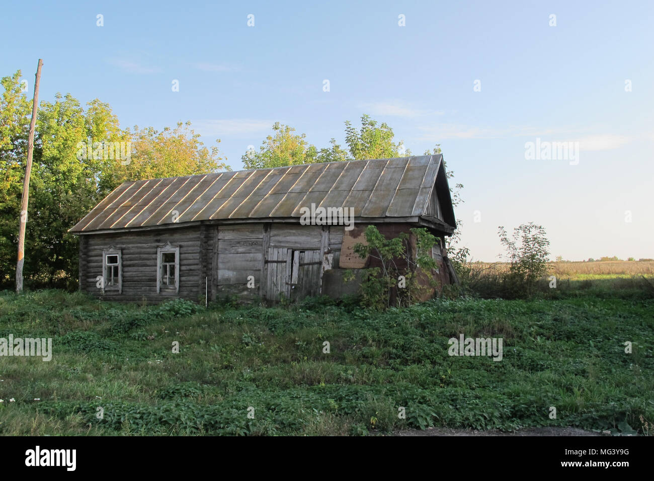 Russian typical rural house with garden and fences Stock Photo - Alamy
