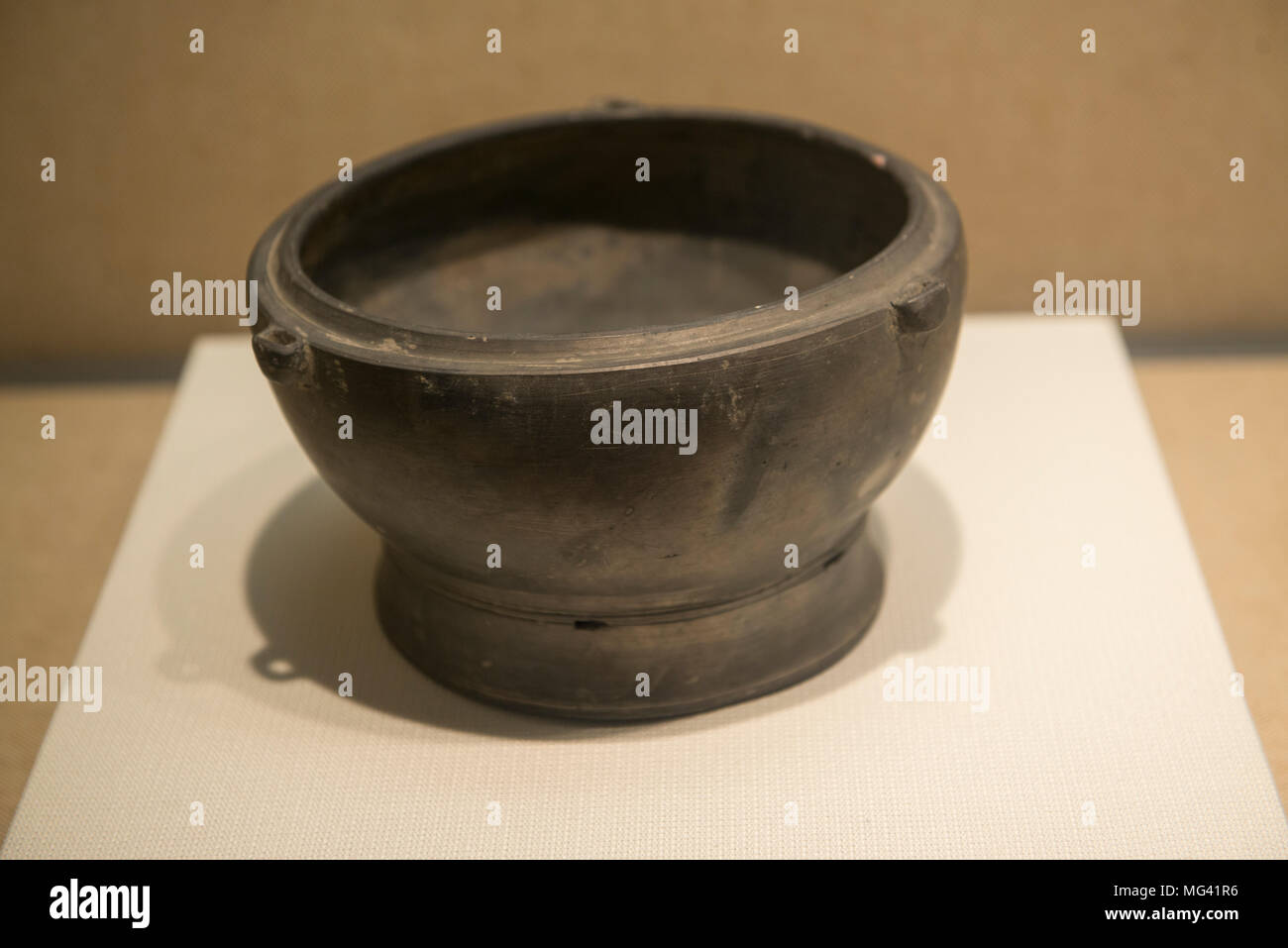 Black pottery Gui, a food vessel of Liangzhu Culture in Zhejiang Museum in Hangzhou, China. Stock Photo