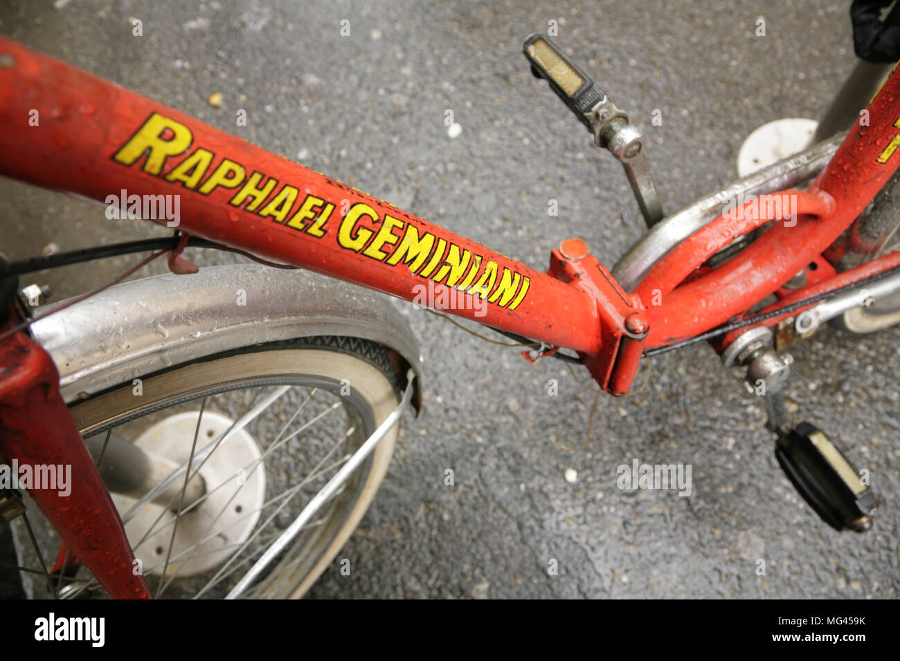 Vintage red Raphael Geminiani branded folding bicycle, Italy. Stock Photo