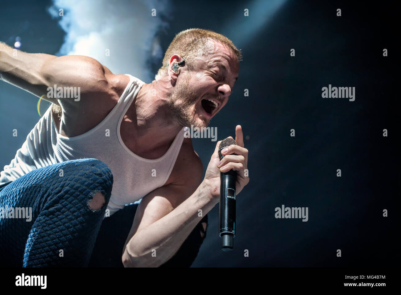 Norway, Oslo - April 25, 2018. The American rock band Imagine Dragons performs a live concert at Oslo Spektrum. Here singer Dan Reynolds is seen live on stage. (Photo credit: Gonzales Photo - Terje Dokken). Stock Photo
