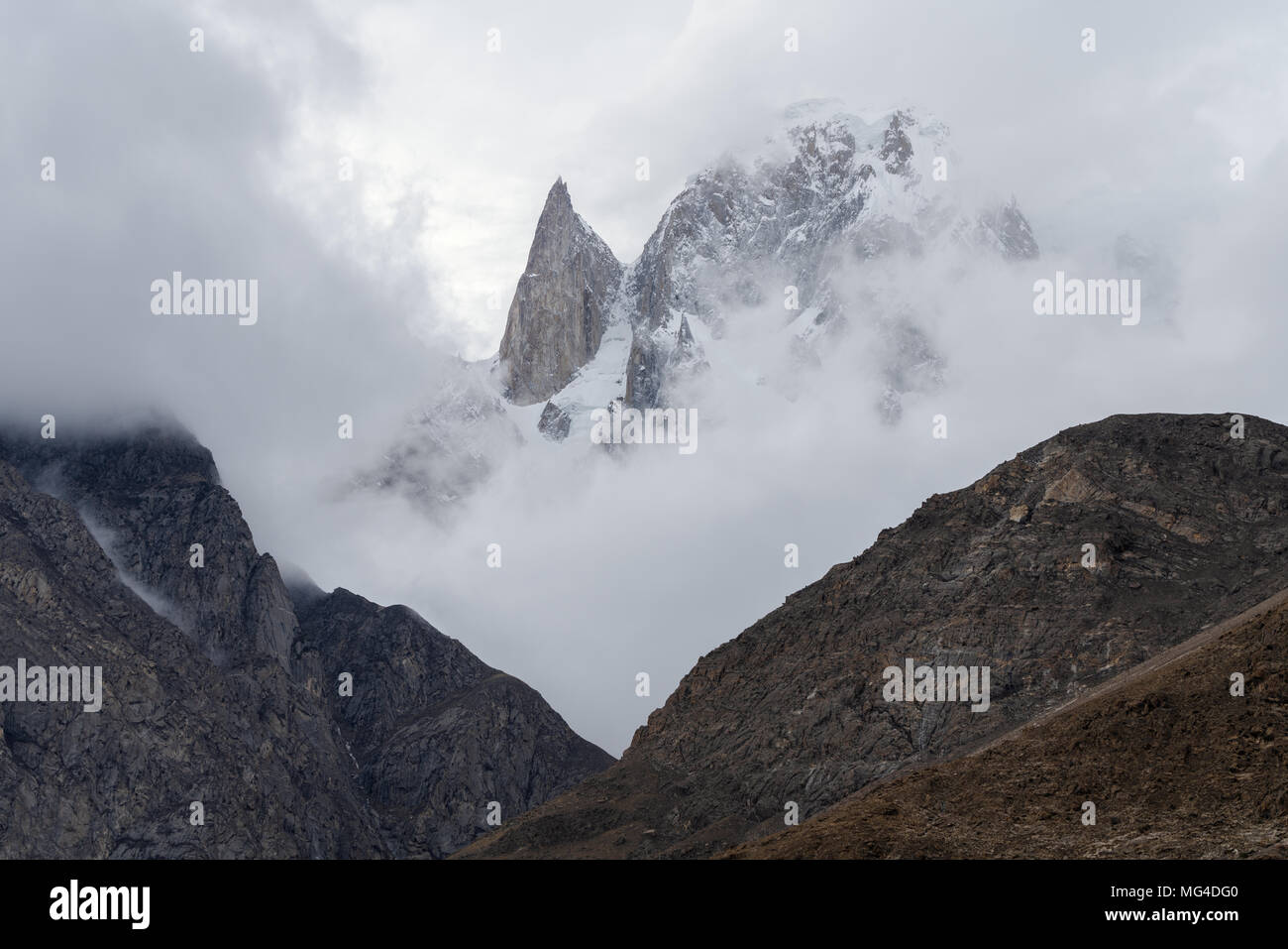 Landscape of mountains in the morning with fog and cloudy environment in the morning, and summit of Lady' finger mountain peak Stock Photo