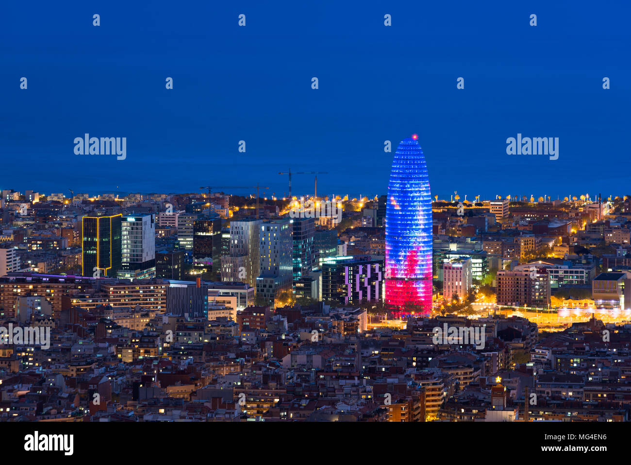 Scenic aerial view of Barcelona city skyscraper and skyline at night in Barcelona, Spain Stock