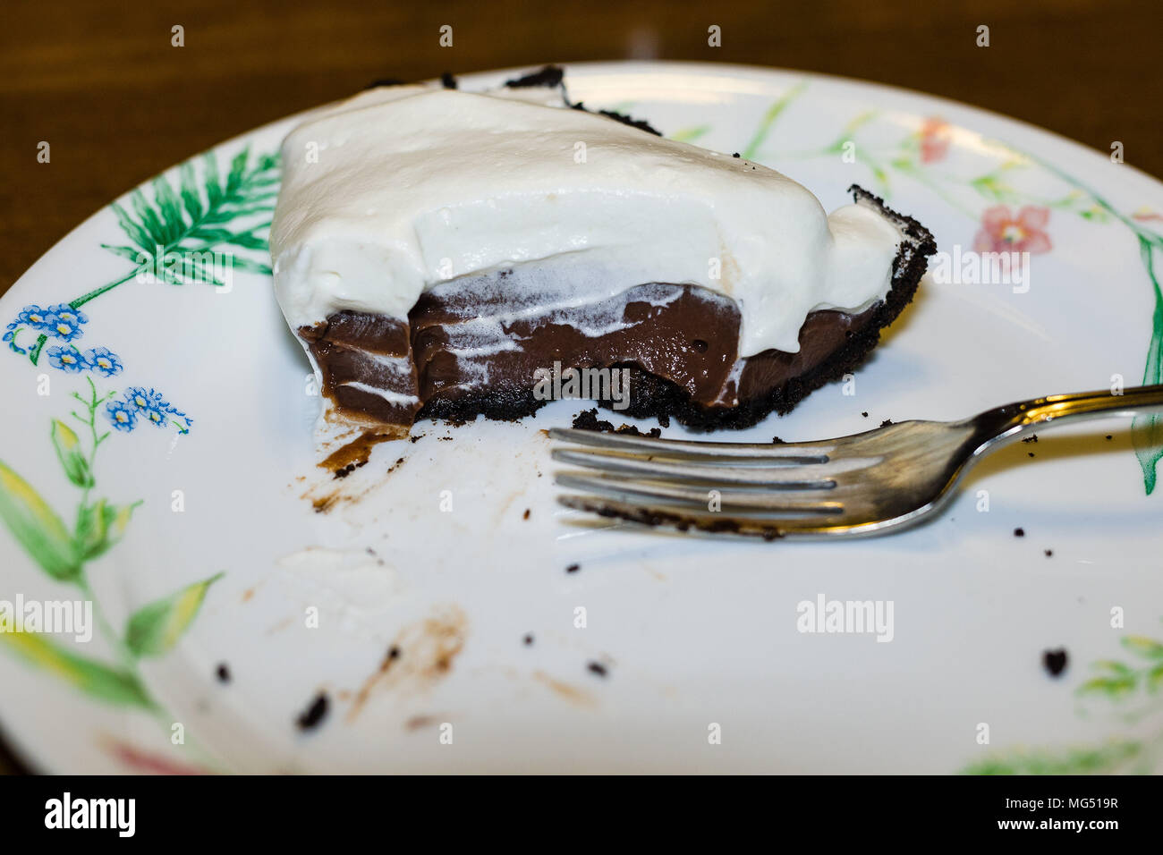 eating some delicious homemade chocolate pie for desert Stock Photo