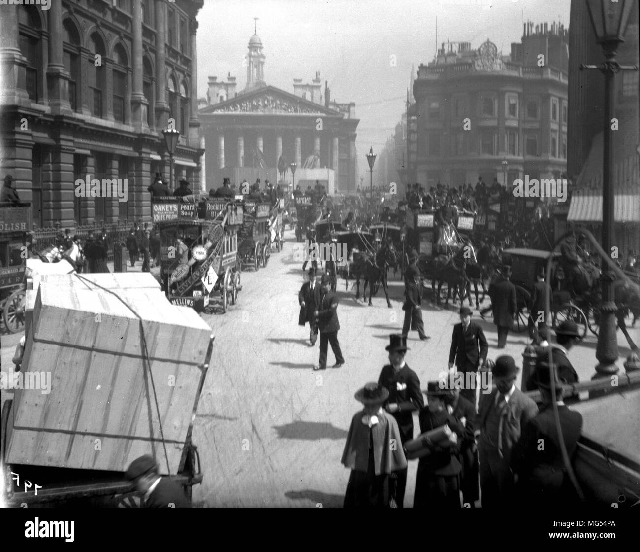 Old historic Victorian London: People going about their business on the streets of the 19th Century City of London in Mansion House Street and The Royal Exchange, in 1896 Stock Photo