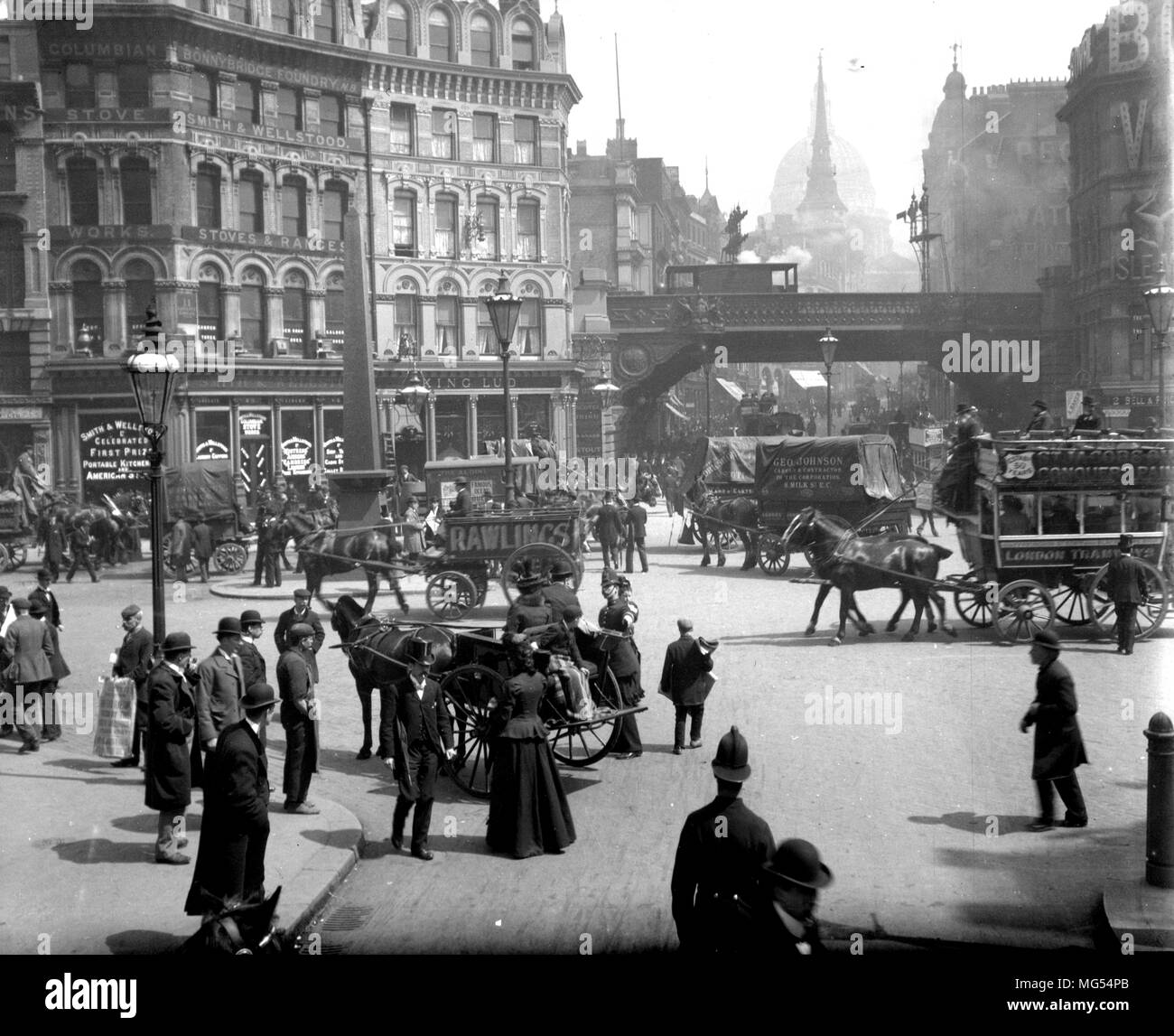 Old historic Victorian London: People going about their business on the streets of 19th Century London in Ludgate Circus, in 1896 Stock Photo