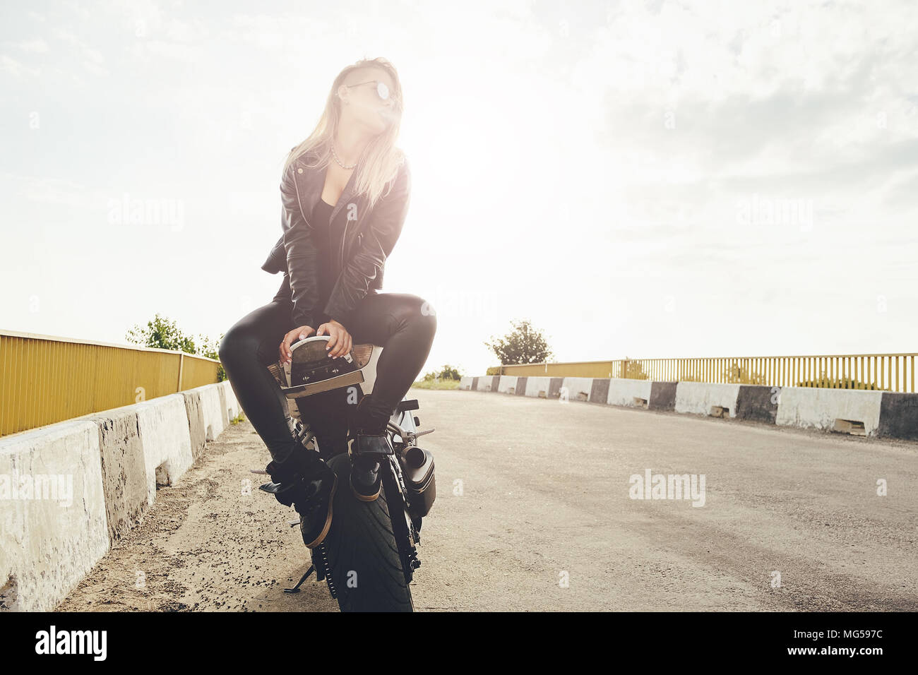 Beautiful biker women enjoying freedom  Stock Photo