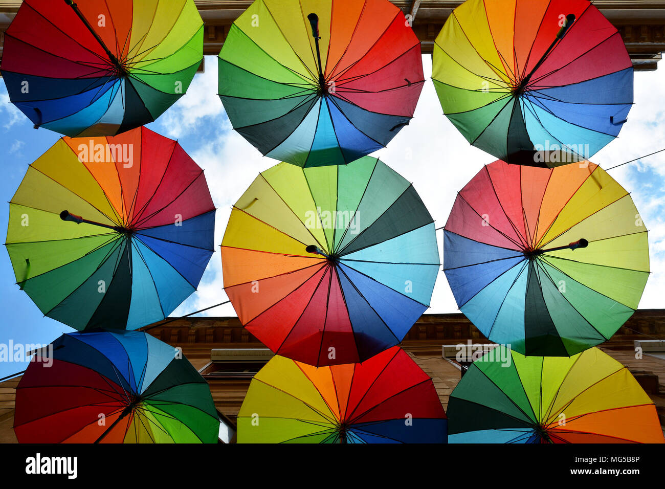 Rainbow umbrellas roof street in Victory Passage , Bucharest, Romania