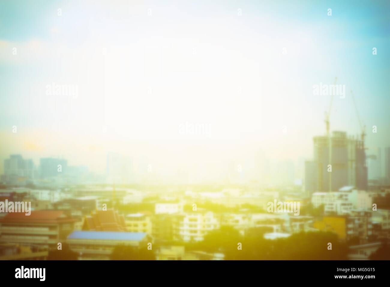 Blurred Building Under Construction and Light Leak Background with Space for Text. Stock Photo