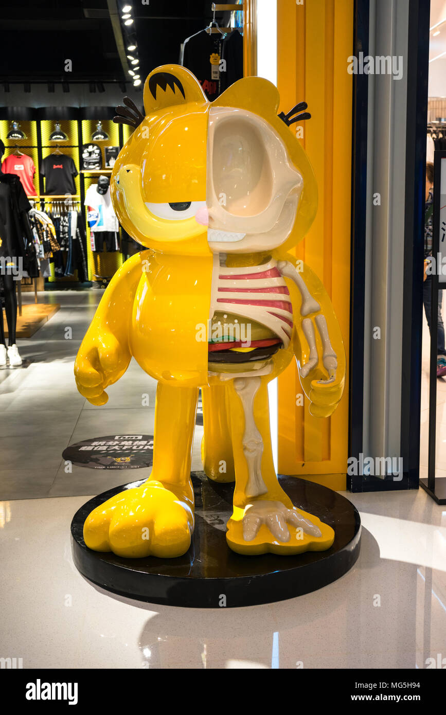 Garfield anatomy insides and half skeleton bones showing hamburger at shopping mall in Shenzhen, China Stock Photo