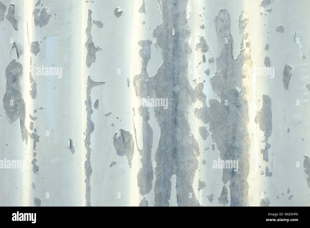 White Peeling Painted Zinc Wall Background. Stock Photo