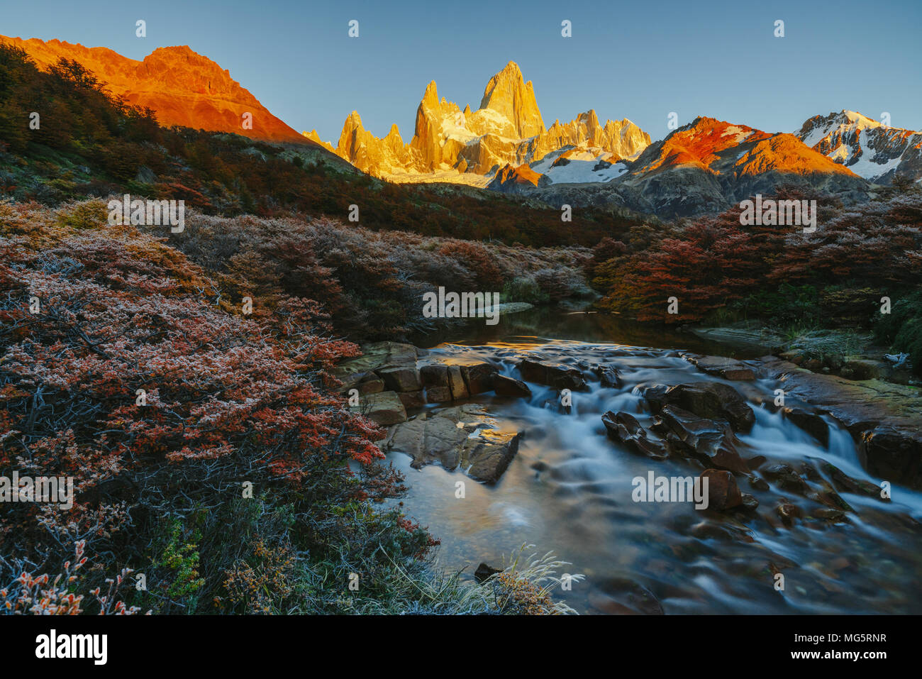 View of Mount Fitz Roy and the river in the National Park of Los Glaciares during sunrise. Autumn in Patagonia, the Argentine side Stock Photo