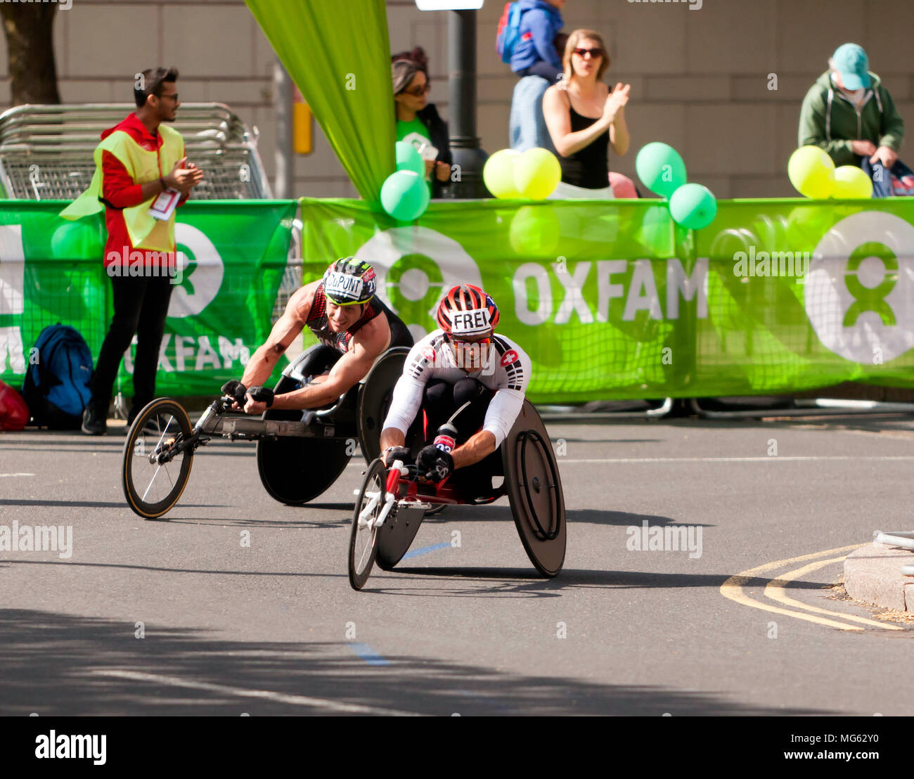 Heinz  Frie  and  Alexandre DuPont  fighting for position  at Cabot Square, during the 2018 London Marathon Stock Photo