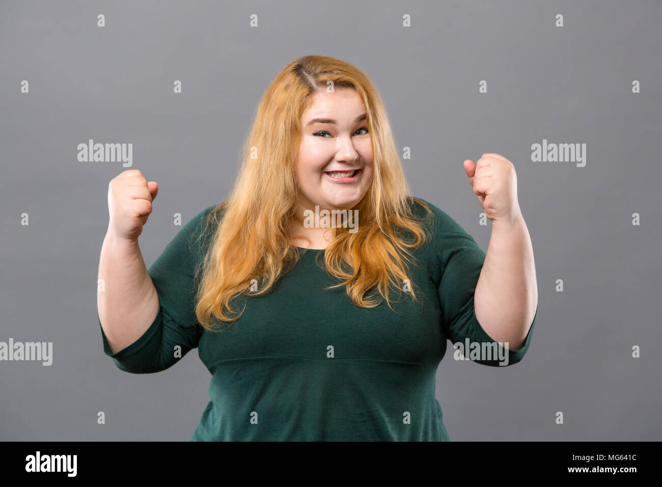 Delighted cheerful woman feeling happy Stock Photo