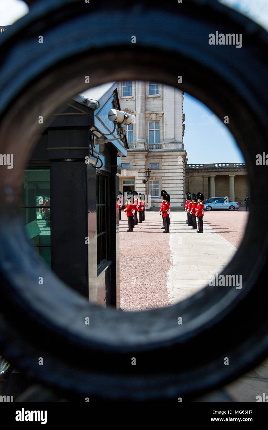 London, United Kingdom - April 23, 2015: Members of a military band in full dress uniform perform inside the grounds of Buckingham Palace. Stock Photo