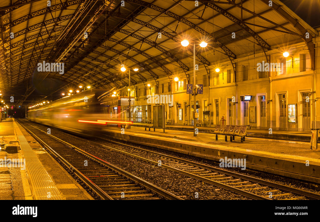 Regional train leaving Avignon station - France Stock Photo