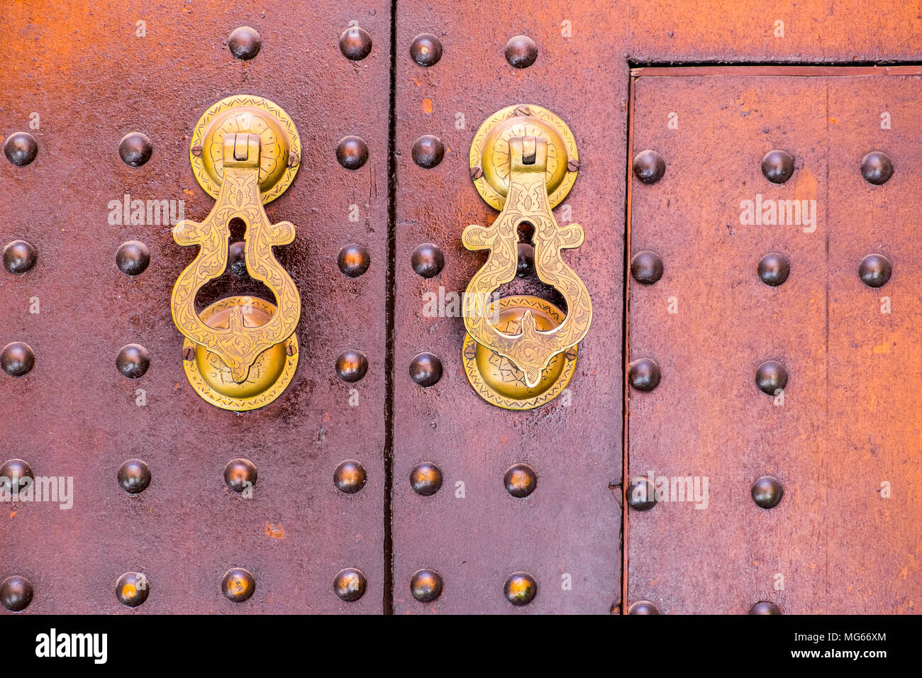 ornate brass door handles on a door in Morocco Stock Photo Alamy