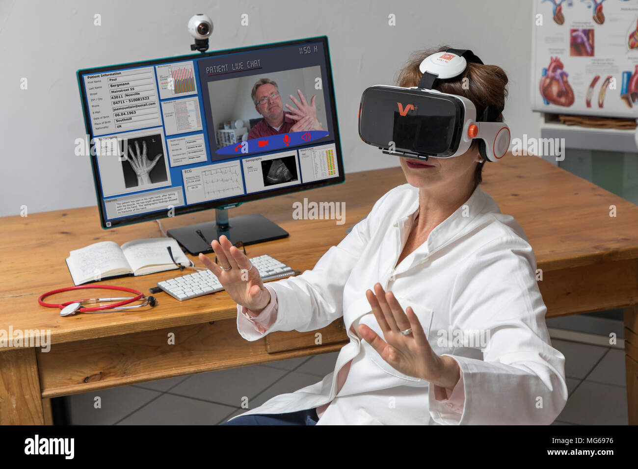 Symbolic photo of telemedicine, a female doctor in a doctor's office